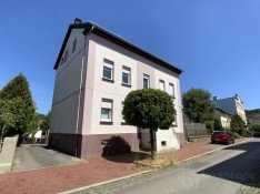 Hauptbild Zweifamilienhaus mit 19 Garagen und vielseitigem Potenzial - jetzt Besichtigung vereinbaren!